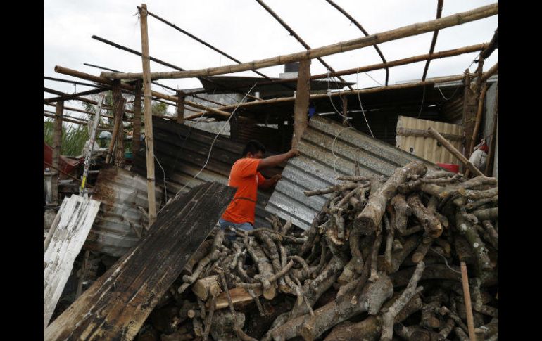 El Mandatario lamentó la muerte de dos personas en un deslave en Veracruz. AP / E. Verdugo