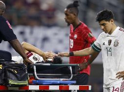 ”Chucky” Lozano salió por la lesión que tuvo en la cabeza con el portero de Trinidad y Tobago. AFP / T. Pennington